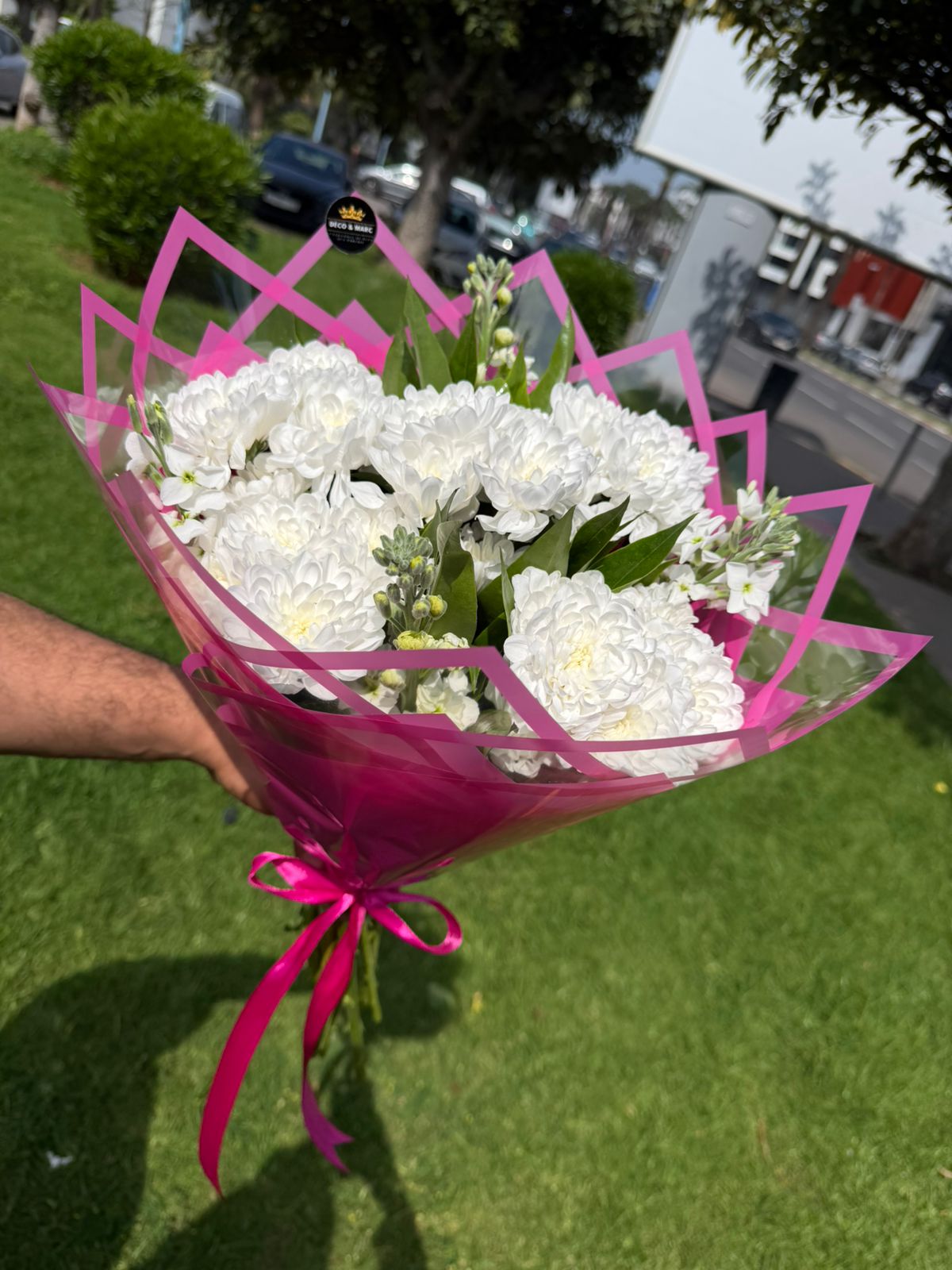 Pure White Carnation Bouquet in Pink Geometric Wrap